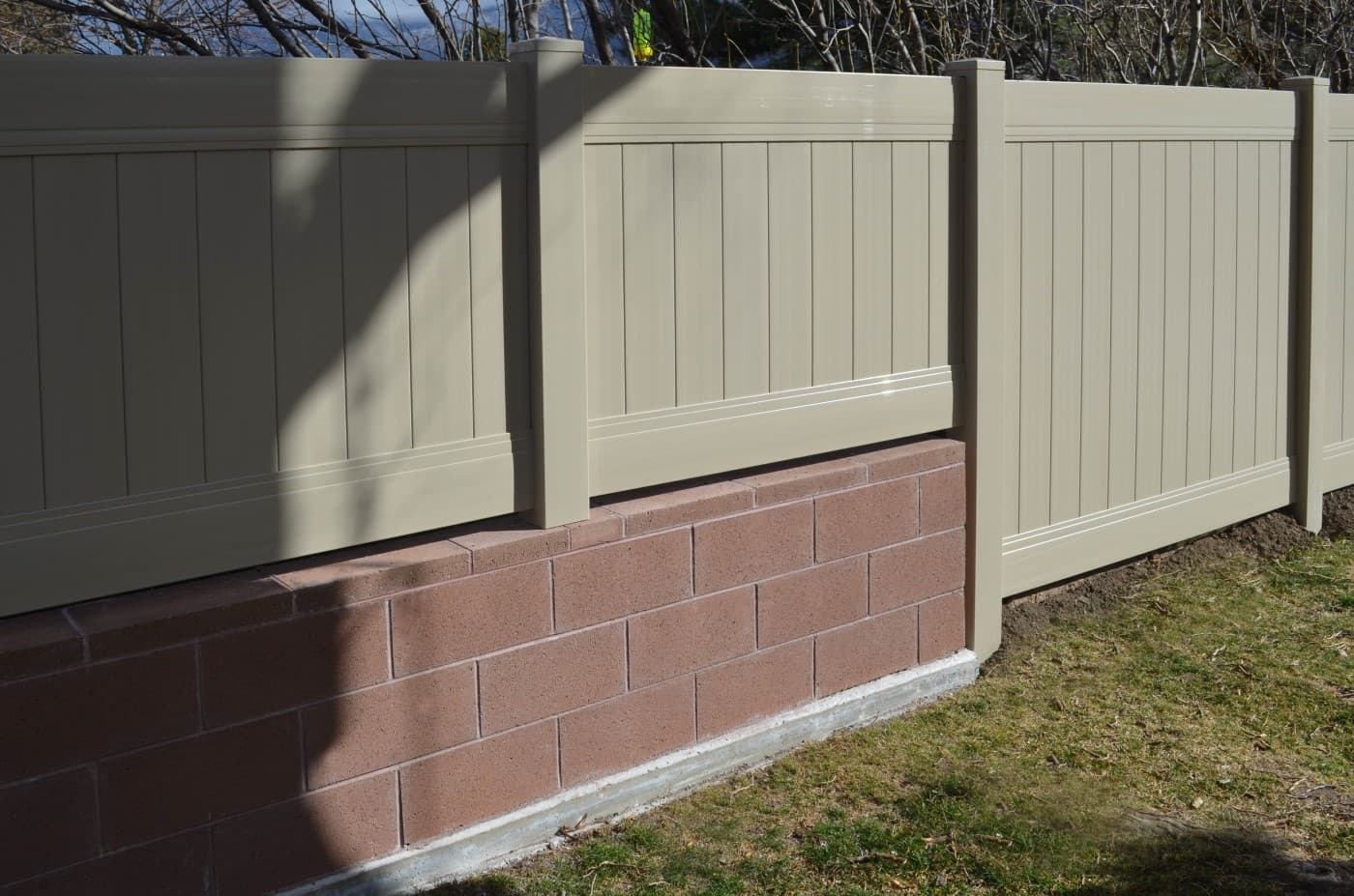 Block Retaining Wall with Vinyl Fence