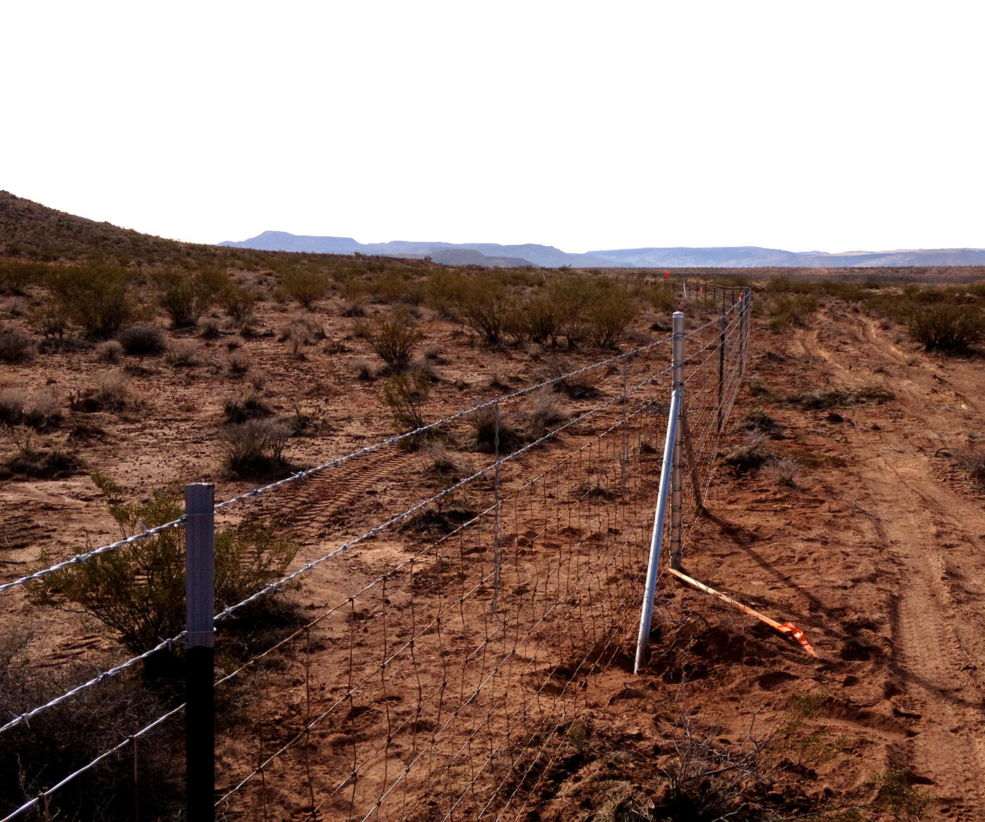 Combination Wire and Barbed Fence