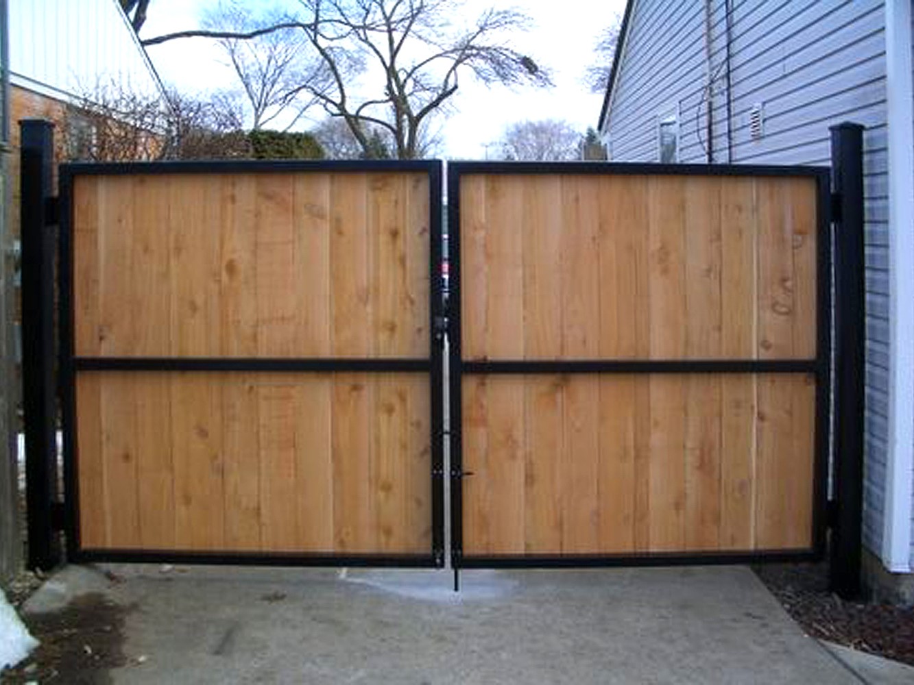 Cedar and Black Metal Gate