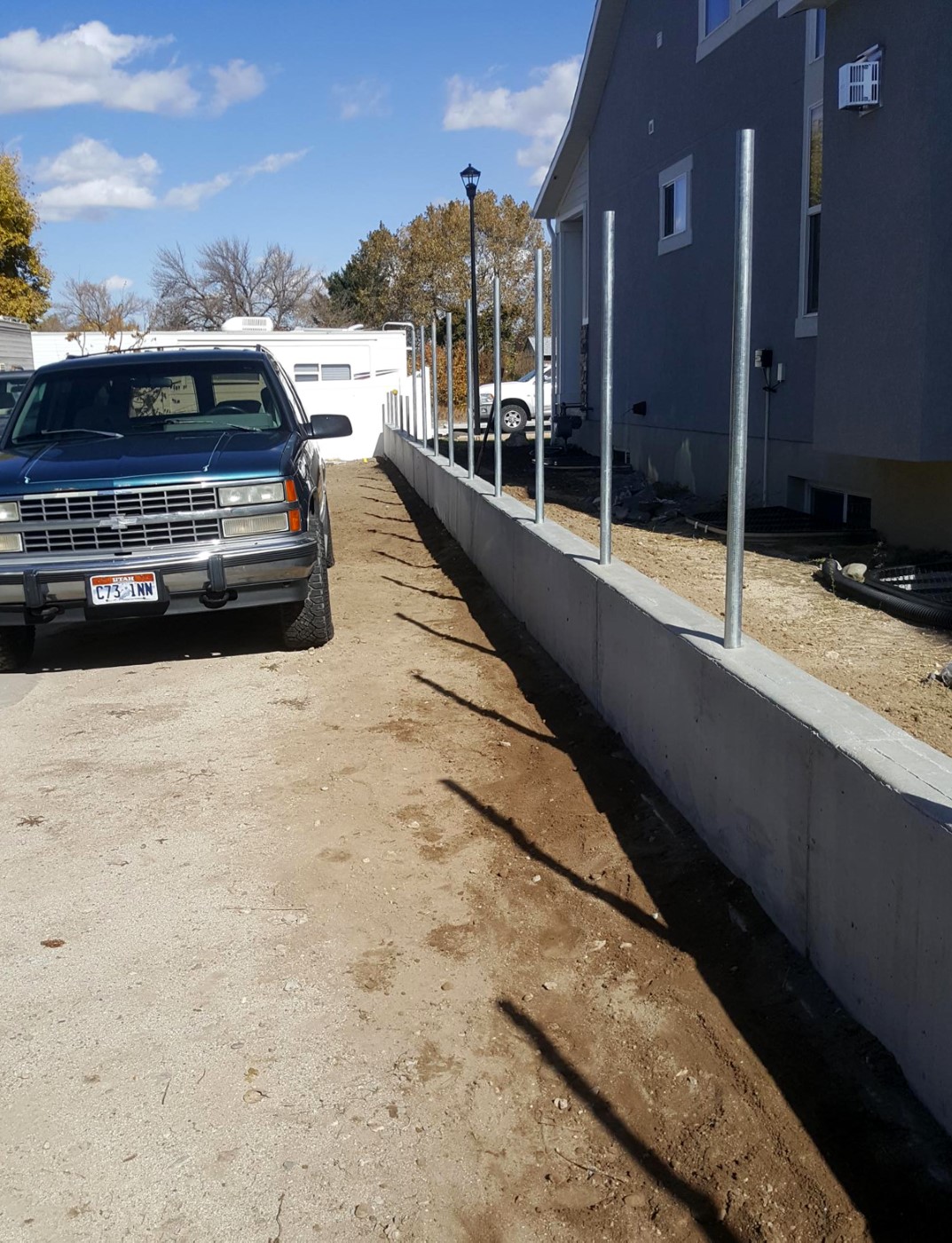 Concrete Retaining Wall with Steel Posts