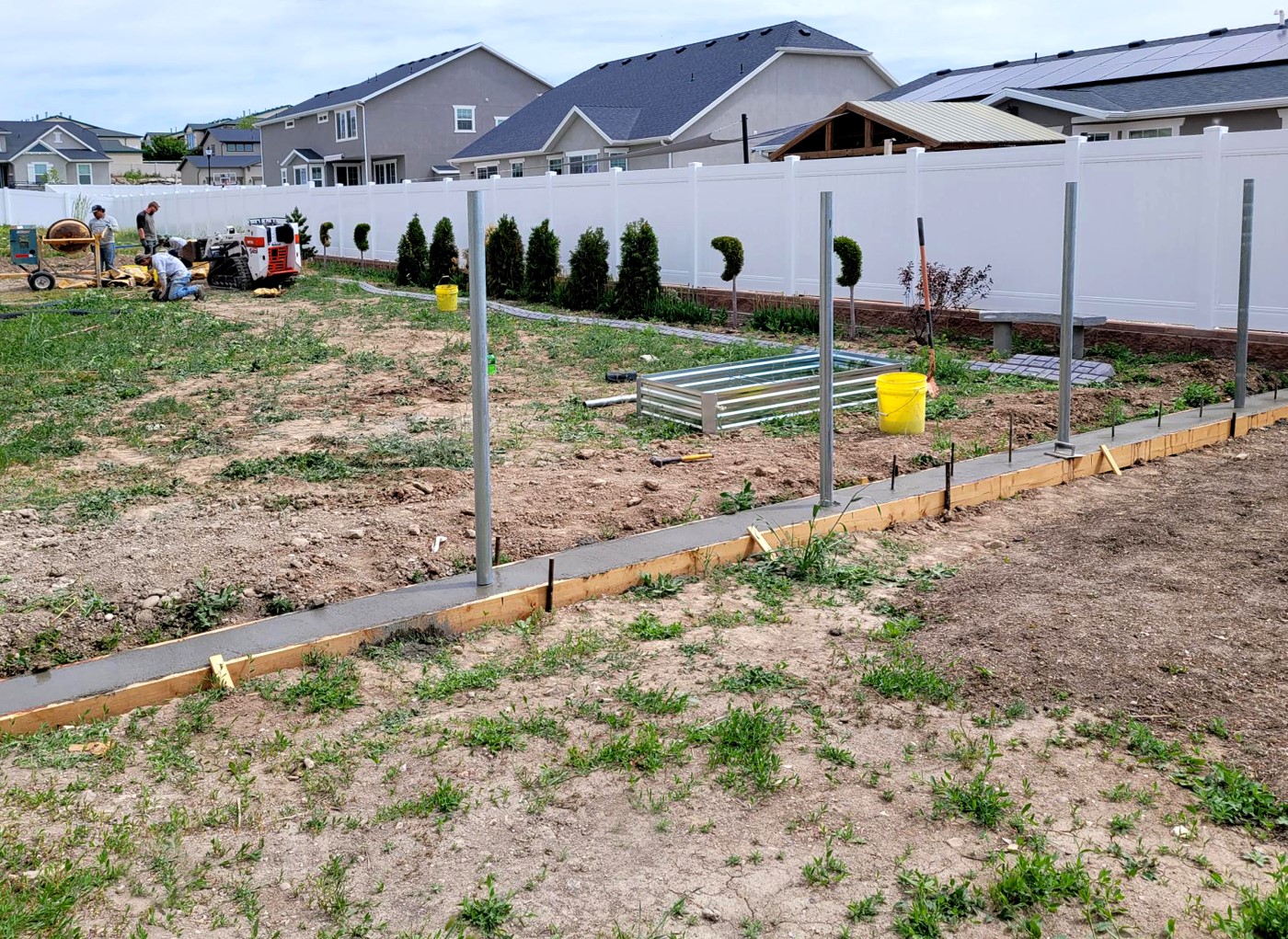 Concrete Retaining Wall with Mow Strip